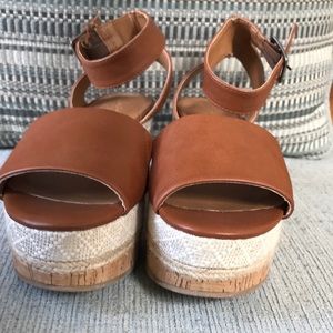 Hi, I am selling brown platform heels from target and they have never been worn